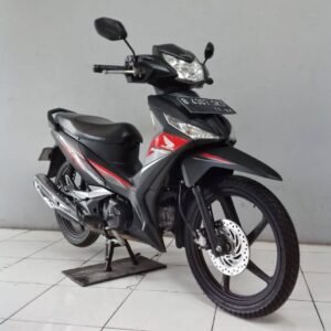 Perbandingan Antara Supra X 125 FI dan Revo X 2024